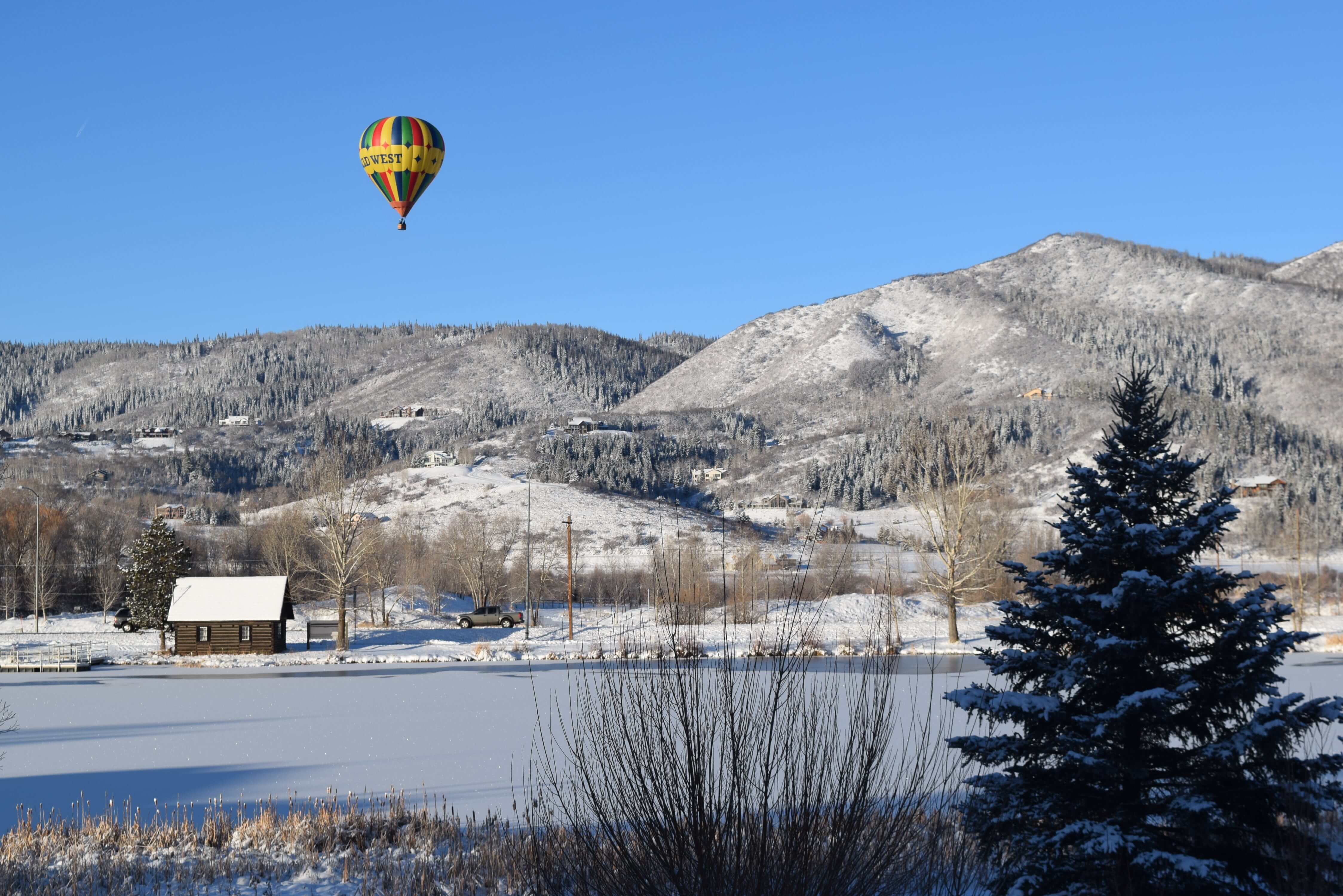 hot air balloon on mountains
